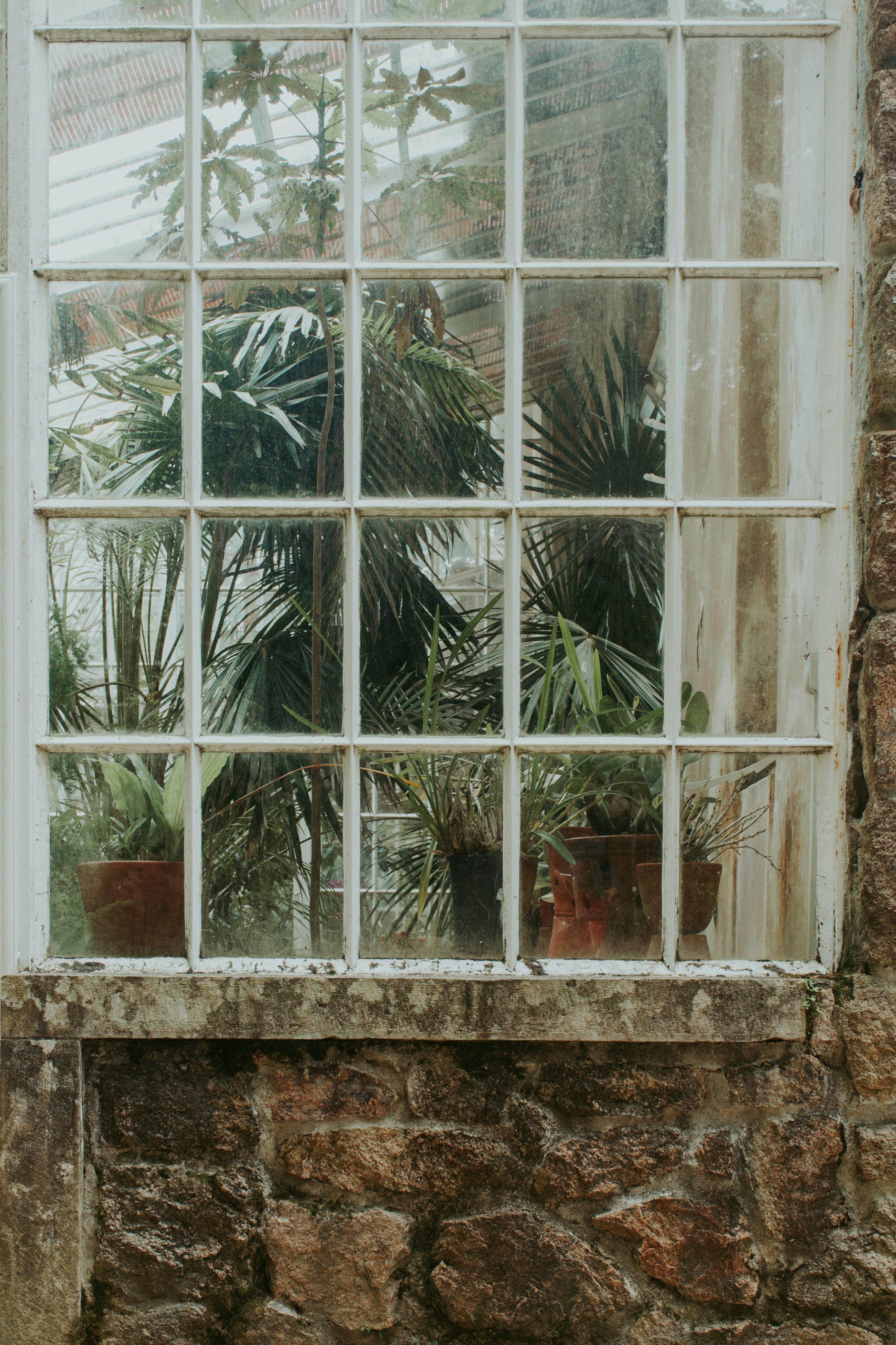 white framed clear glass window